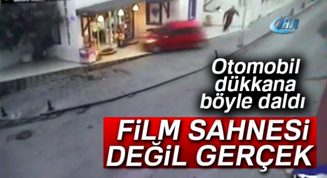 Yoldan çıkan otomobil dükkana böyle daldı